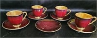 Carlton Ware teacups and saucers.  One extra