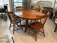 A Farmhouse-style Dining Table with Four Chairs