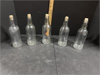 Five Clinton Bottles