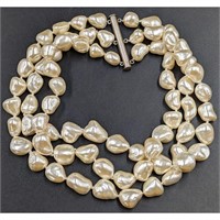 A Fine Three String Baroque Pearl Choker Necklace
