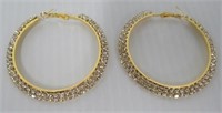 Women's large hoop earrings.