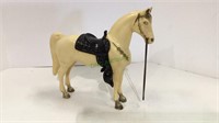 Vintage hard plastic toy horse measuring 7
