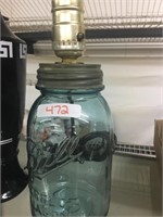 green bell jar made into lamp base