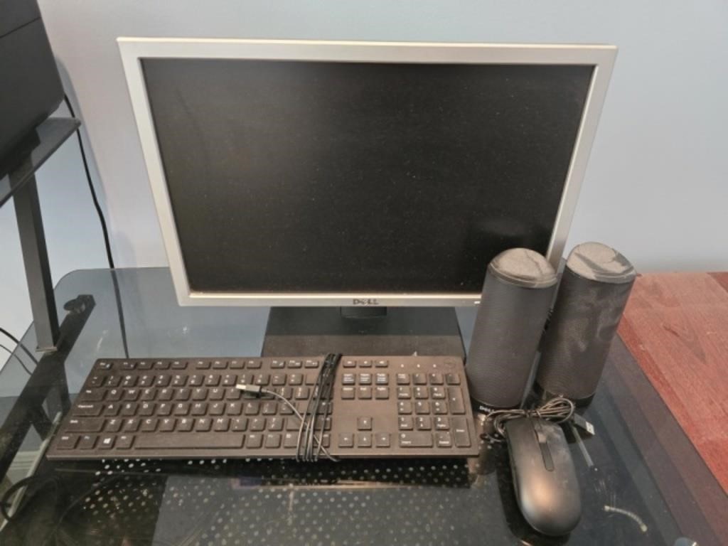 Dell monitor, keyboard, speakers and mouse