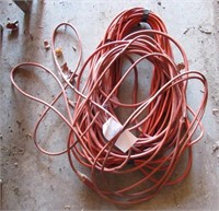 (2) Extension cords, (1) needs repair.