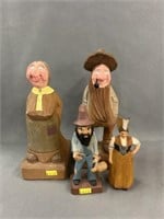 (4) Unsigned Carved Wood Figurines