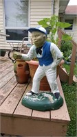 Concrete jockey with hook in hand 25.5" tall