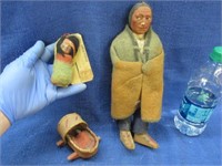 2 old skookum indian dolls & baby in cradle