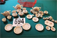 Child's Tea Sets in a Red Wire Basket(R9)