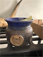 Small pottery jar with native design
