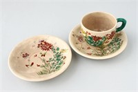 Japanese Earthenware Cup and Two Saucers,