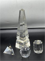 Crystal obelisk and three other forms