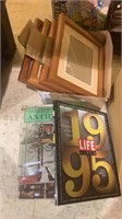 Box lot with four picture frames, two books on