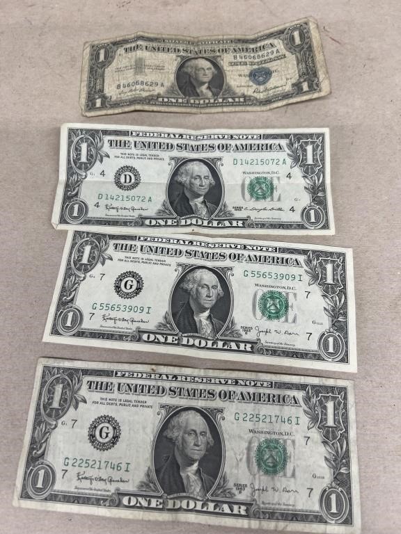 1957 silver certificate and (3) 1963 dollar bills