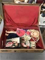 dolls in suitcase