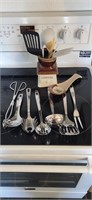 Group of kitchen utensils plus dish