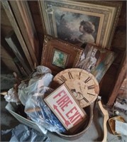 Wall Hangings coat hangers, and a fire exit sign.