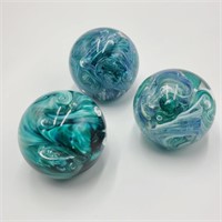 3 Signed Schuster Teal Glass Paperweights