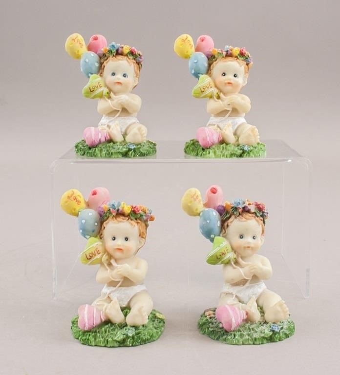 Four Porcelain Baby Dolls Sculptures