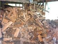 Huge Qty of Split Firewood stored in lean-to –