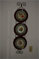 469: wall decor platers in rack 41in H