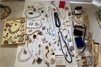 Bag of mixed costume jewelry - necklaces,