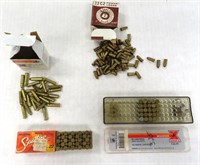 Collection of .22 caliber rimfire cartridges.