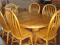 Solid oak oval dining table and 6 chairs