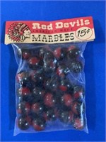 red devils marbles - sealed - 25