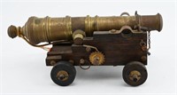 Antique brass toy cannon