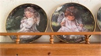 Collectors’ plates and plate shelf