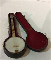 Replica toy miniature banjo in case measuring 9