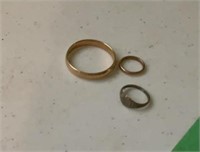 Baby rings and man wedding ring
