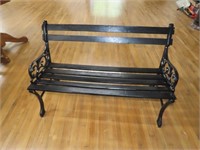 Painted cast iron & wood bench.