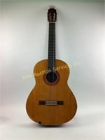 Yamaha C – 40 Acoustic six string guitar.