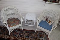 2 Wicker Chairs with 2 Pillows and a Wicker Table