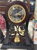 Standing clock with pendulum