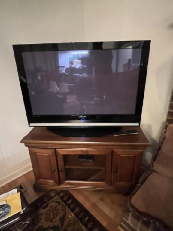 Wooden entertainment center and Samsung TV