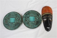 Two Asian wall plaques, 7.75" diameter and