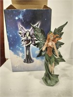 Carved and painted fairy 8 in tall