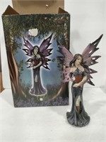 Carved and painted fairy 8 in tall