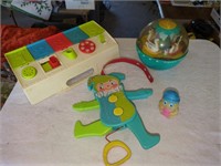 Fisher-Price Rolly-Polly toy, and Jumping Jack,