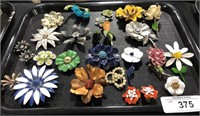 Tray Of Flower Costume Pins.