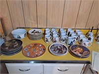 Numerous Norman Rockwell plates and cups