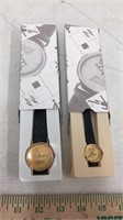 Pair of promotional Olympic watches, new in box