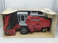 MF 850 combine old  1/16