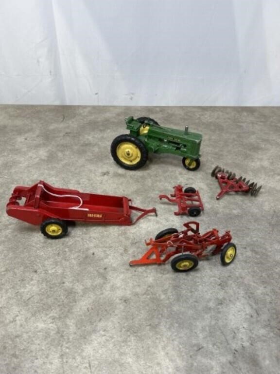 Vintage metal toy farm equipment and John Deere