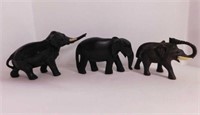 2 carved wood elephant figurines - Metal