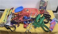 Pet collars, leashes and other supplies.
