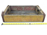 Yellow Coca-Cola crate